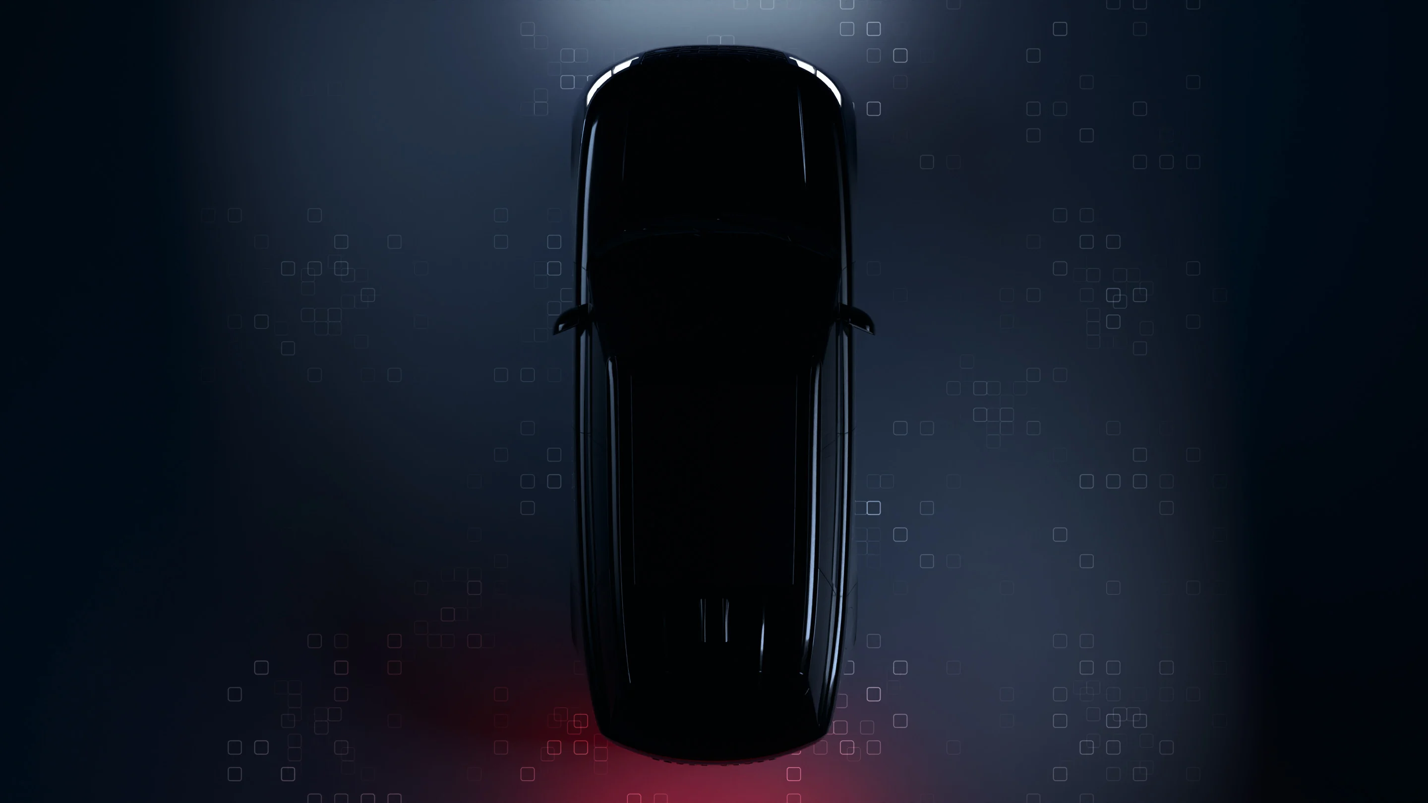 A car seen from above in the dark